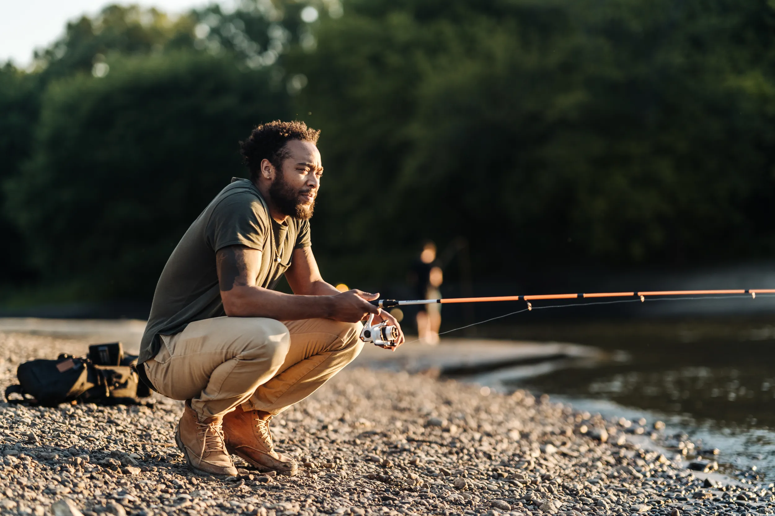 A man fishing on the Mississippi River from Pike Island