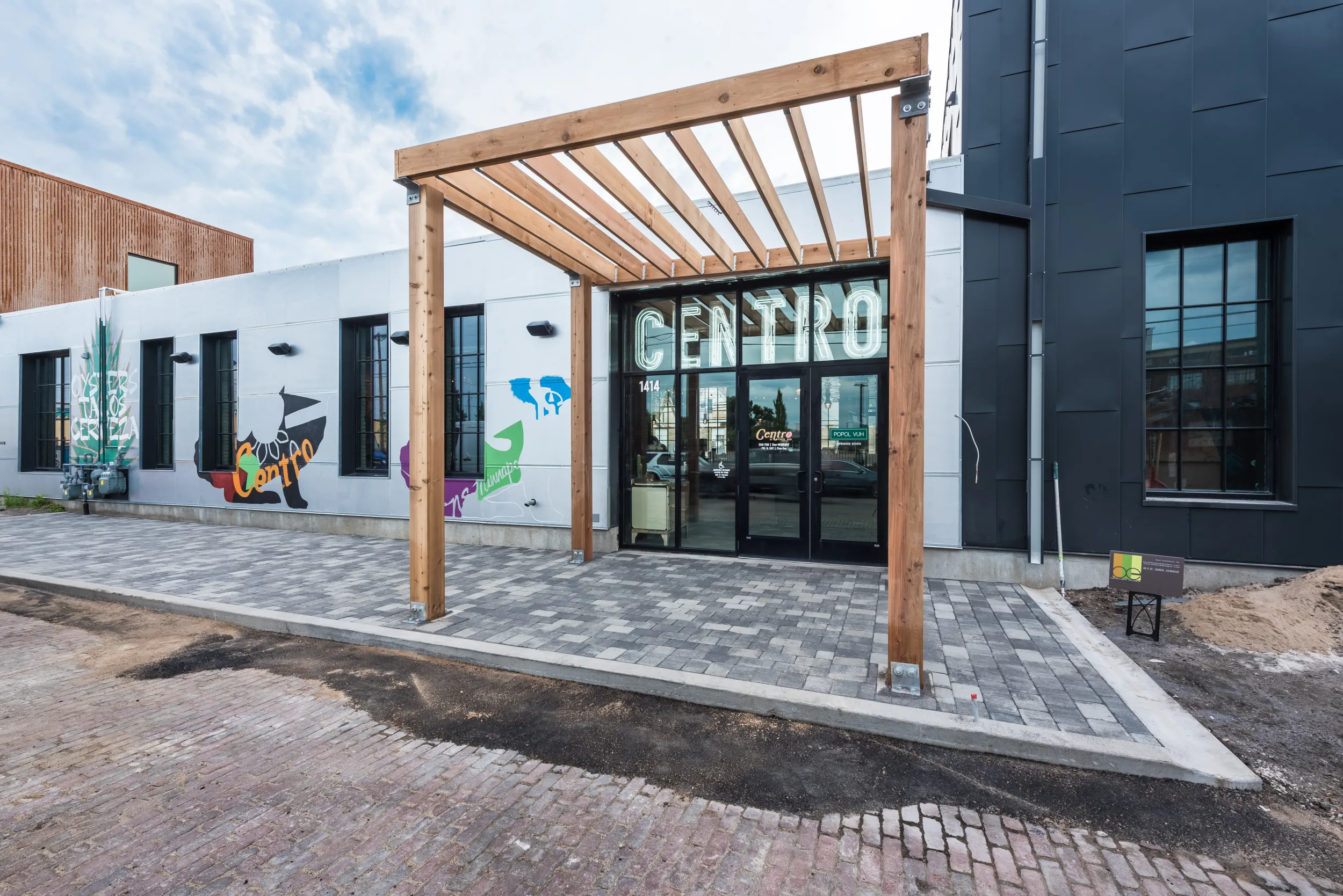 The colorful, mural-covered exterior of Centro