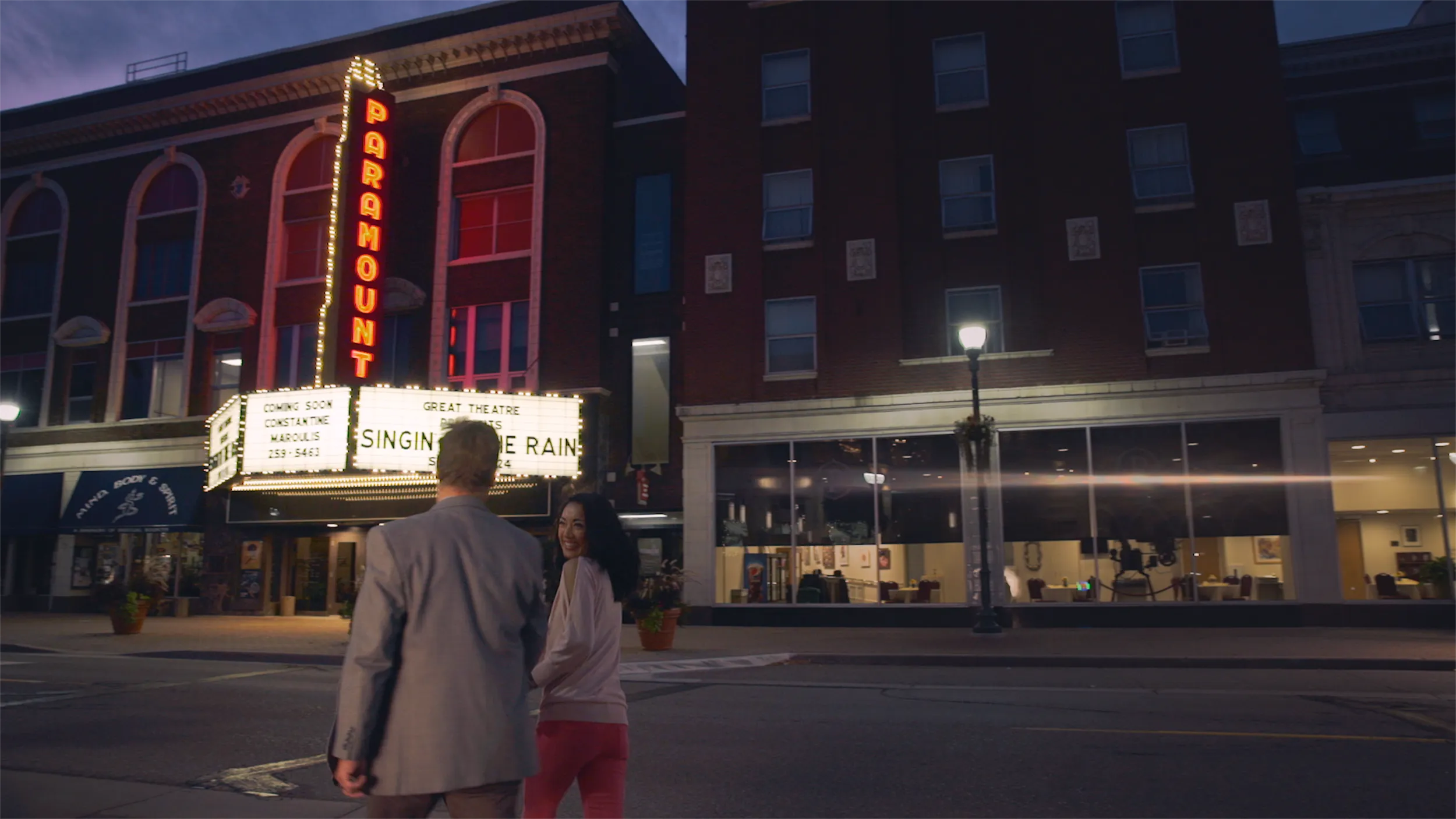 Couple outside Paramount Theater in St. Cloud