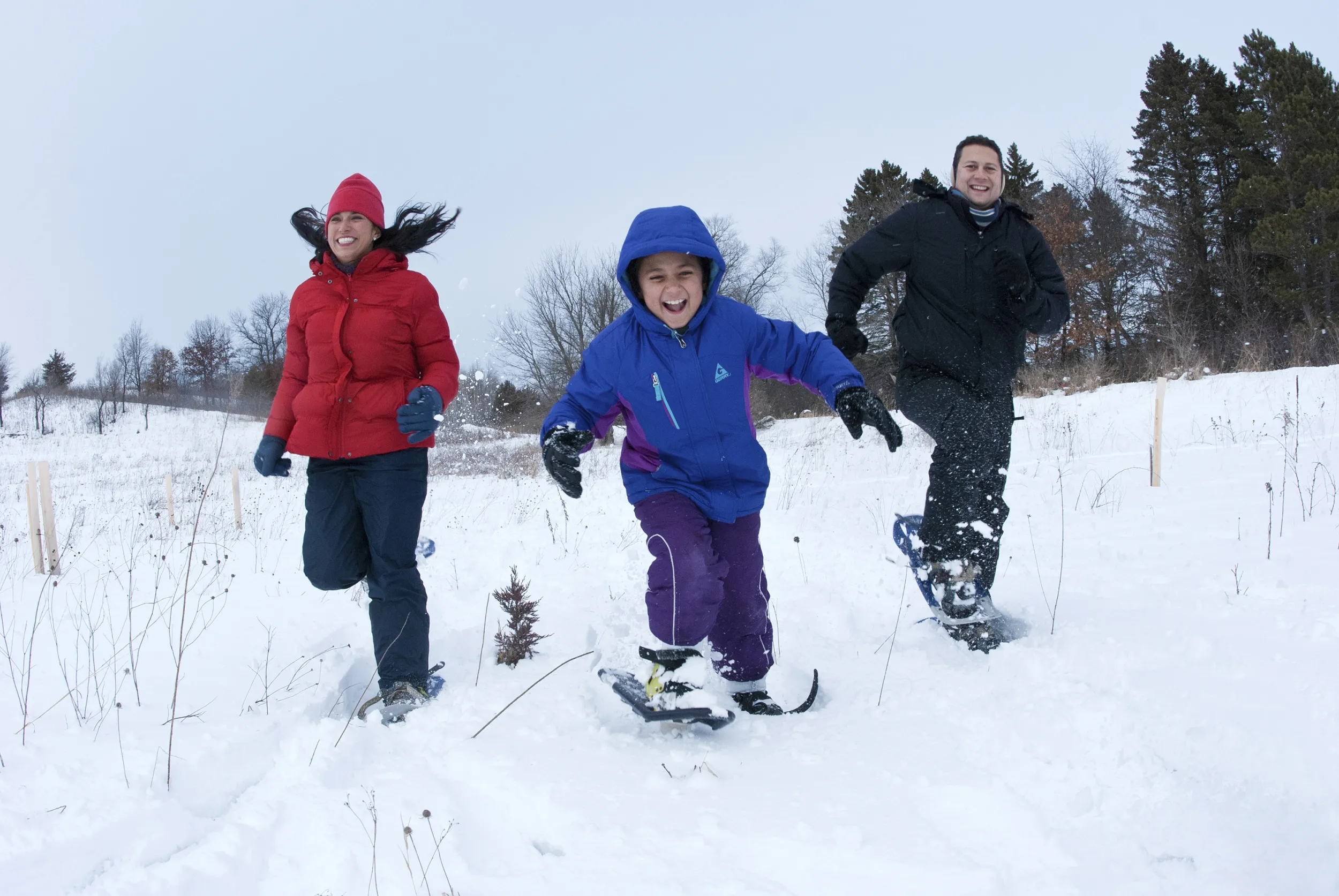 A family snowshoeing in Afton State Park