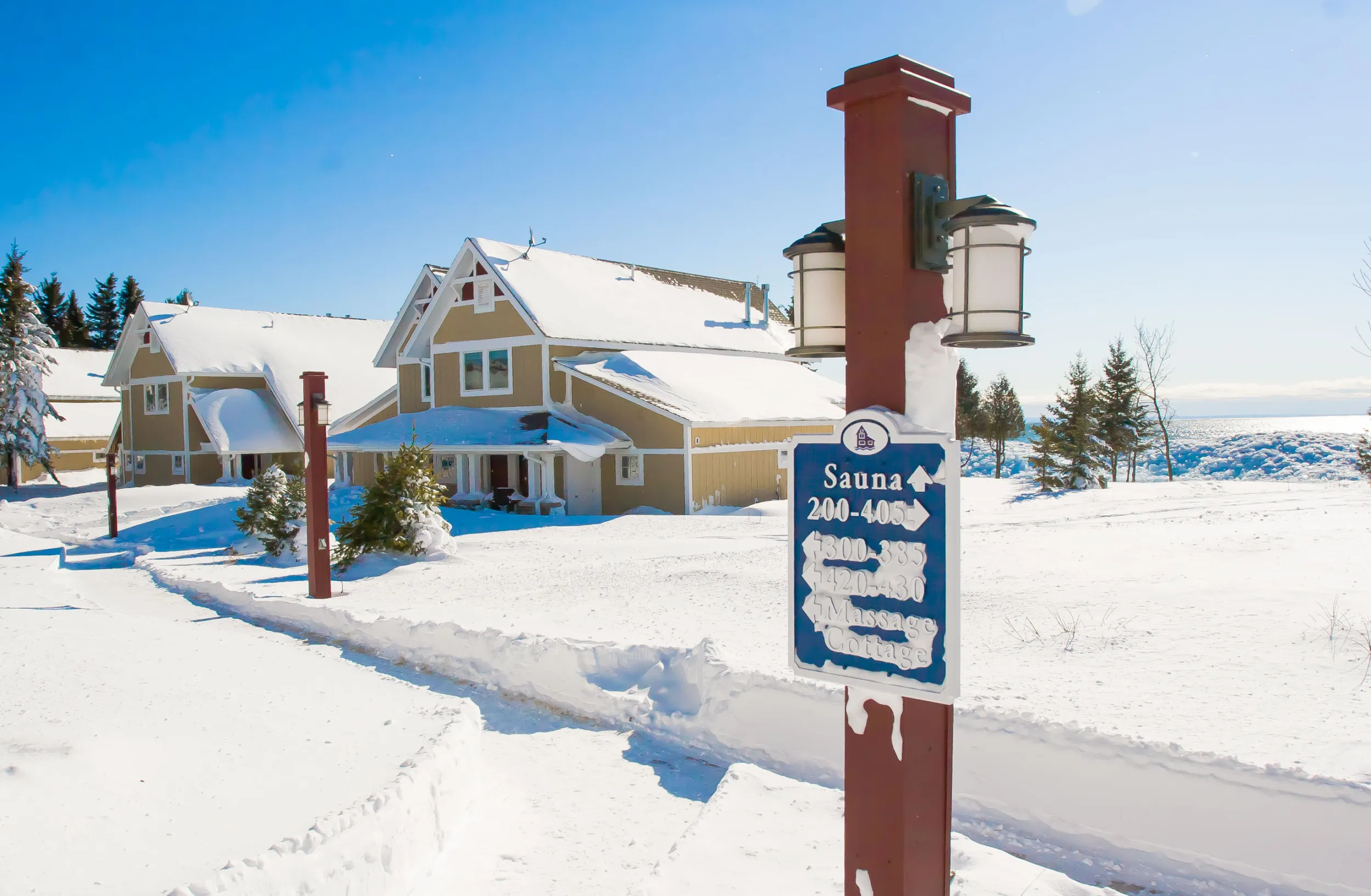 A snow-covered Larsmont Cottages in Two Harbors