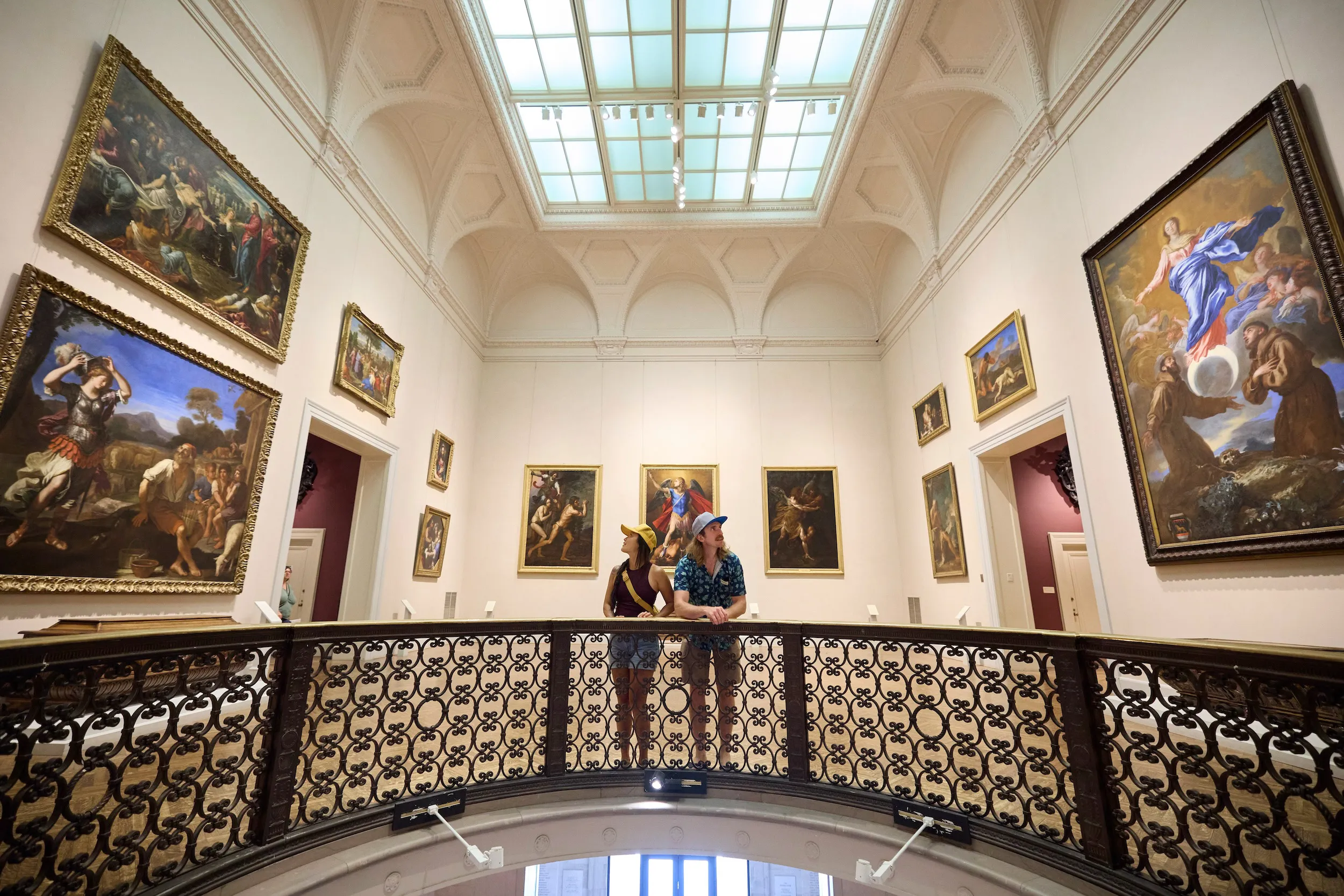 A couple stands in one of the main galleries at Minneapolis Institute of Art