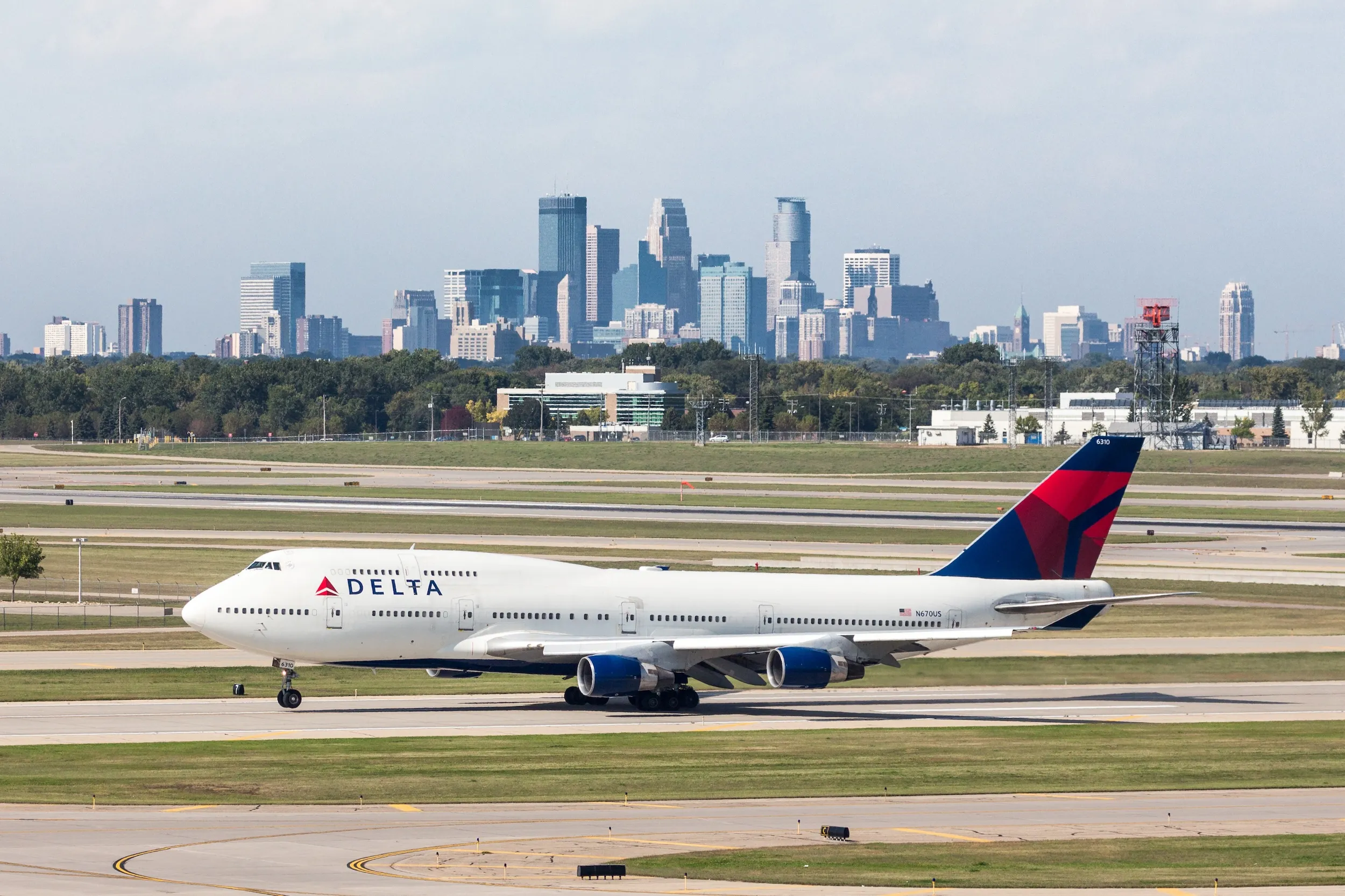A Delta airplane sits on the tarmac at MSP Airport