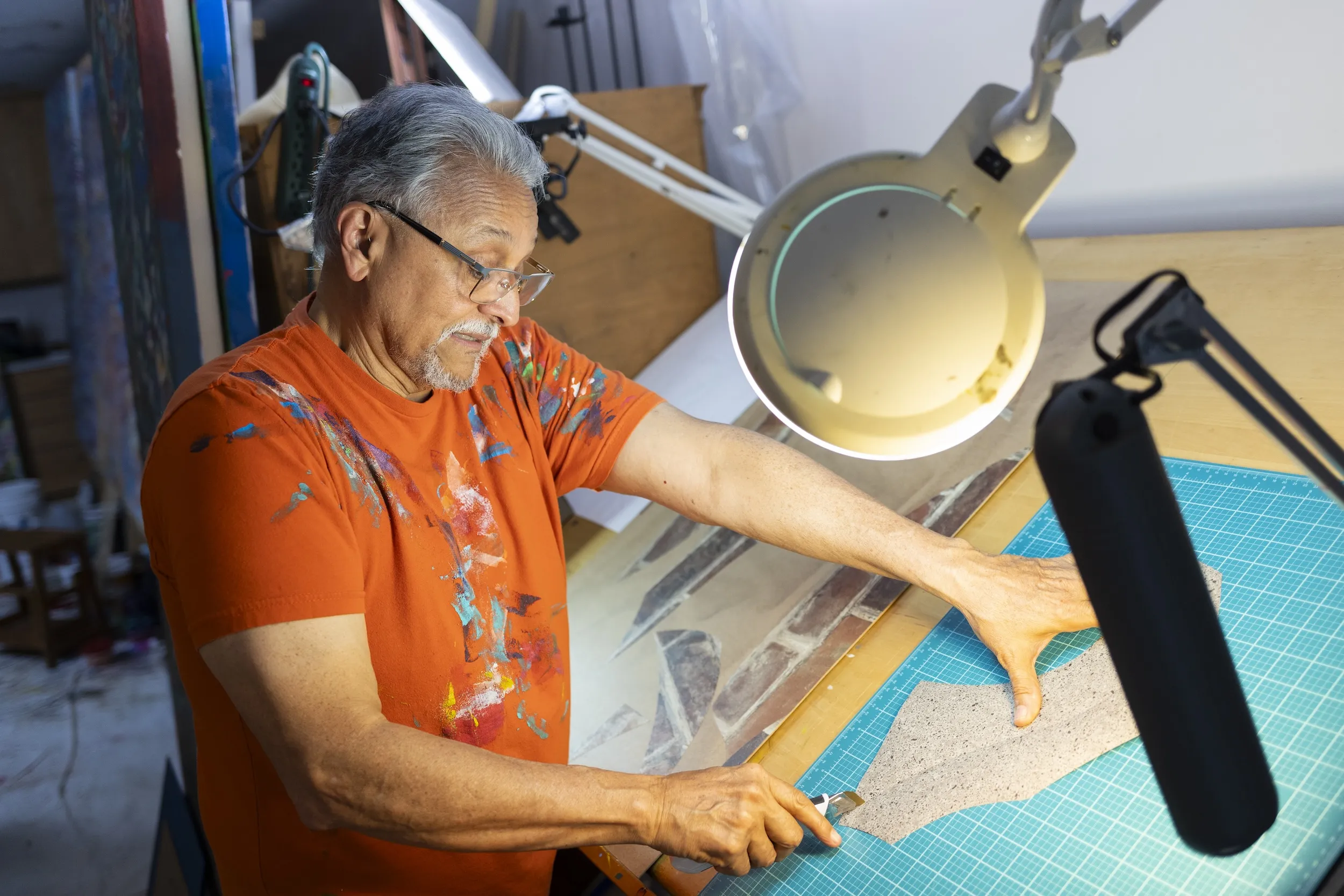 Artist Jimmy Longoria works with material from 3M