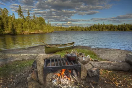 Boundary waters camp kitchen over a fire pit