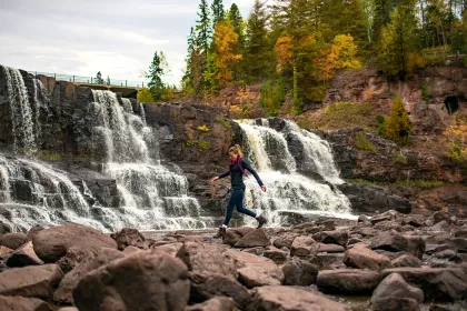 Woman hiking at Gooseberry Falls State Park