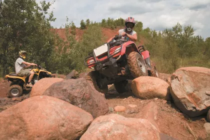 ATV rider rock crawling at the Iron Range OHV Recreation Area in Gilbert