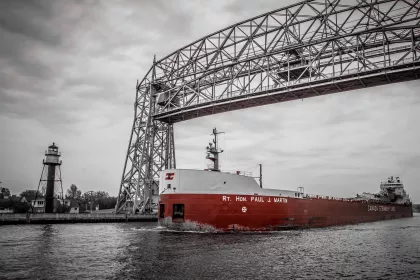 Ship passes beneath the Aerial Lift Bridge in Duluth