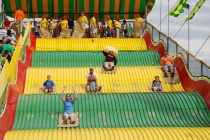 People gliding down the Giant Slide at the Minnesota State Fair