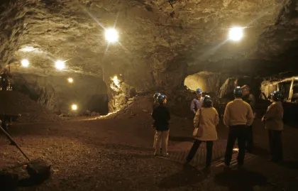 Visitors touring an abandoned iron ore mine