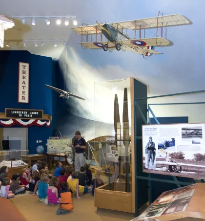 Kids learning about Charles Lindbergh in Little Falls museum