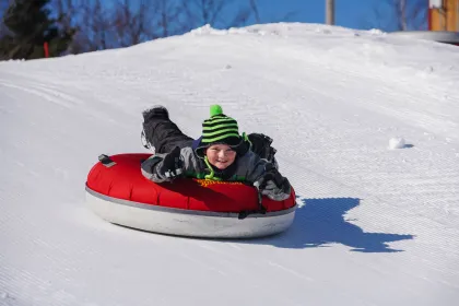 Kids snowtubing at Spirit Mountain