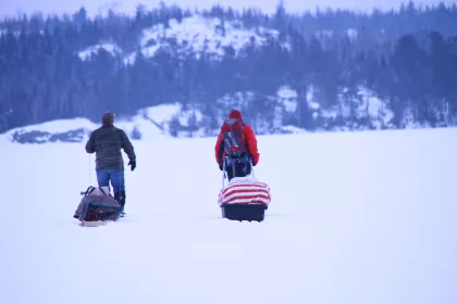 Two campers bring supplies into the Boundary Waters by sled