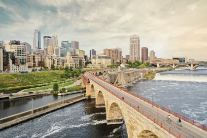 Aerial shot of Downtown Minneapolis Skyline and Stone Arch Bridge