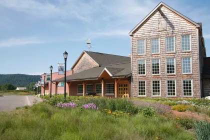 Exterior photo of the Minnesota Marine Art Museum and its lush natural surroundings
