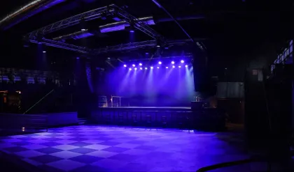 Interior of the First Avenue stage, lit in purple