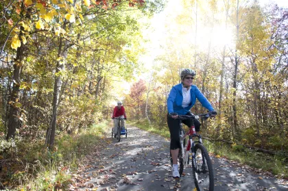 2 people biking on the Paul Bunyan Heartland bike trails near Walker