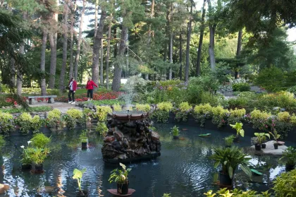 A small pond with a fountain at Munsinger Flower Garden, St Cloud