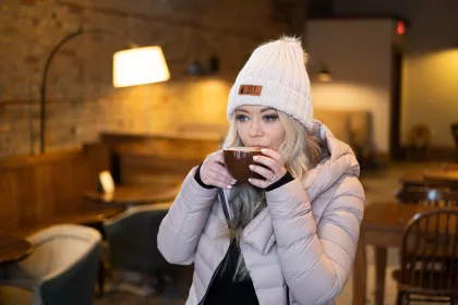 Carly Aplin drinking coffee in Ely