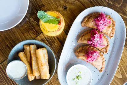 Crawfish empanadas and yucca fries at Guacaya Bistreaux