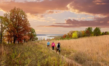 A group of friends hike at Frontenac State Park