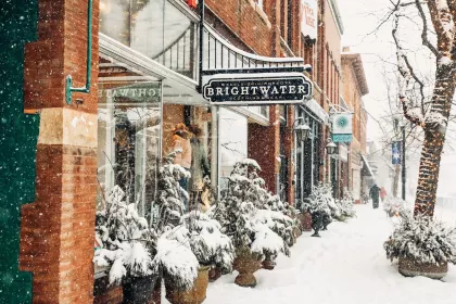 Snow falls outside Brightwater in Excelsior