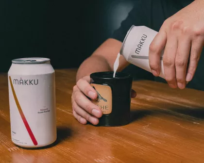 A couple of Korean rice wine cans at Juche St. Paul