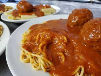 A couple plates of pasta at Yarusso Bros