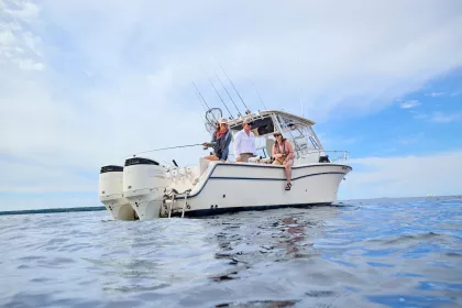Two women fish from a small boat on Lake of the Woods