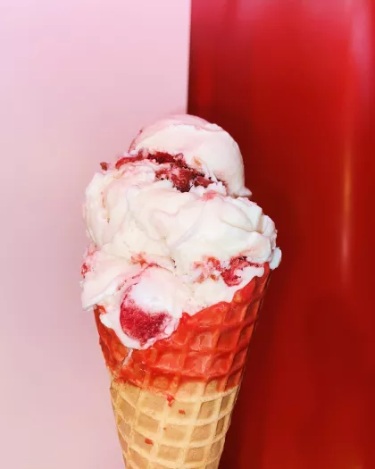A cone with Door County Cherry ice cream at Licks Unlimited