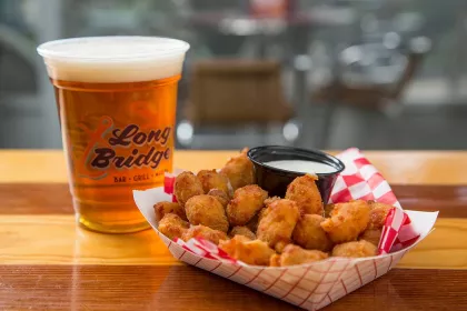 Cheese curds and a draft beer at Long Bridge in Detroit Lakes