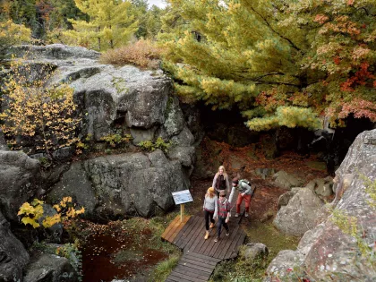 A family hikes at Interstate State Park
