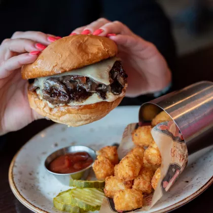 A cheeseburger and cheese curds at Red Cow