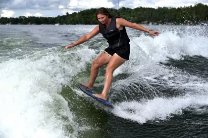 A guide wake surfing at Madden's on Gull Lake