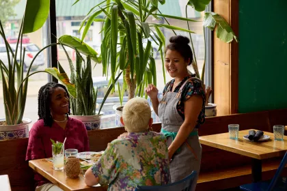 Chef Christina Nguyen visits a table at Hai Hai