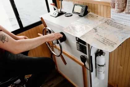 Steering a houseboat in Voyageurs National Park