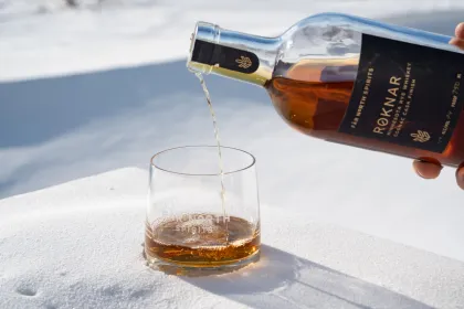 A snow-side pour of whiskey at Far North Spirits