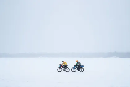 A couple bikers compete in the Arrowhead Ultra 135 race