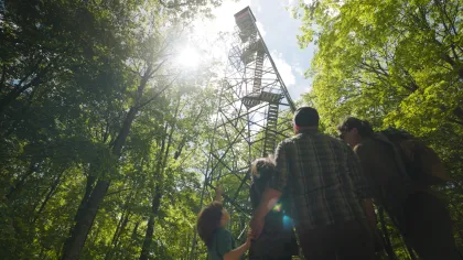 A family hiking at Mille Lacs Kathio State Park