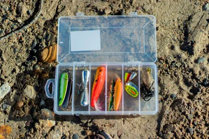 A tackle box along the Mississippi River