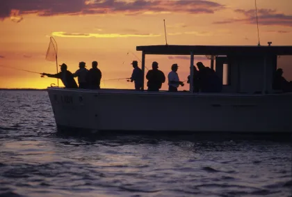Fishing at sunset from one of many launch boats on Mille Lacs Lake