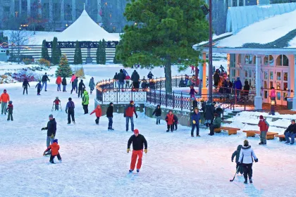 Families ice skate at Centennial Lakes Park in Edina