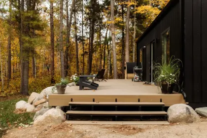 A deck overlooking the forest at Oda Hus