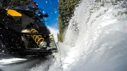 A snowmobiler kicks up snow in the Leech Lake area