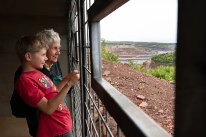 A grandfather and his grandson at the Hull Rust Mahoning Mine View
