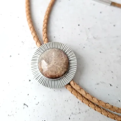 A fossilized coral bolo tie from Jovy Rockey Jewelry