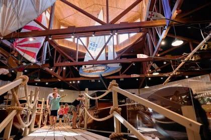 A family walks around Alexandria's Legacy of the Lakes Museums