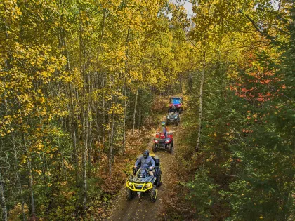 ATV riders on the Iron Range trail during the fall