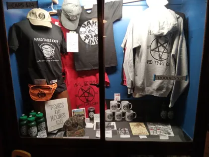 A window full of merch at Hard Times Cafe