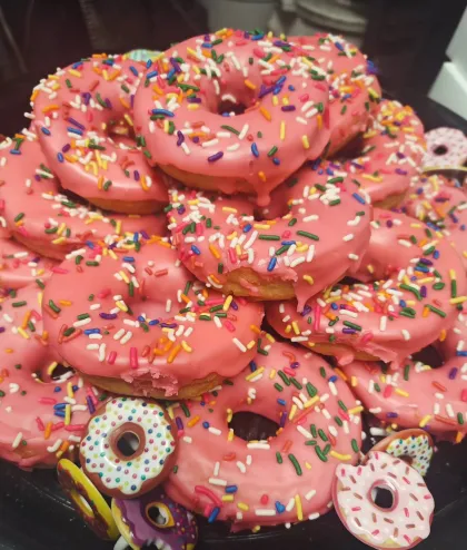 A pile of pink Drift Dough donuts at Old Abe &amp; Co.